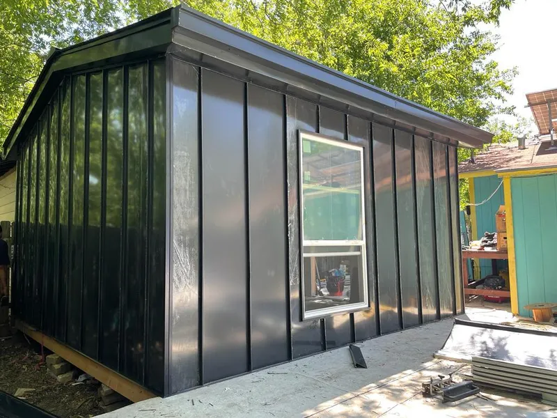 Black standing seam metal wall panels for Roof Inspection in Nacogdoches